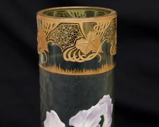 Closeup of the large Legras Mont Joye art glass vase, beautiful art nouveau design of blooming purple and white irises with gilt leaves against a textured frosted green glass ground, the rim with organic forms and scrolls of gilt. Mont Joye L C mark to the base.