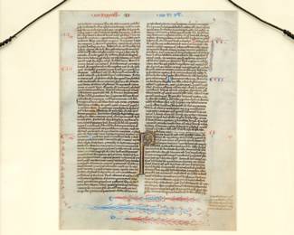 Reverse view of the framed leaf from a Bible produced in the manner of William de Brailles workshop, Oxford, circa 1230-1240. Timothy leaf with fine gold initials and herringbone feathers emerging from the mouth of dragons.