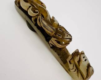 Another view of the Chinese carved jade "dragon" belt hook, carved with a scroll form chilong facing a dragon head terminal