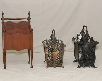 Three vintage/antique magazine stands, one in wood with dividers, the other two c. 1920's in cast iron with handles.