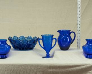 Cobalt blue glass vases, pitcher, and large bowl