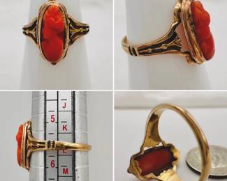 An antique carved coral cameo ring in an unmarked gold setting.