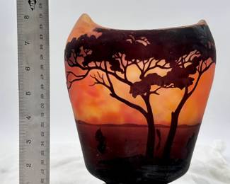 A Daum Nancy cameo glass vase decorated with sailboats on a lake seen through trees, in purple/black on an orange and yellow ground, acid etched, signed in cameo 'Daum Nancy' with the Croix de Lorraine mark