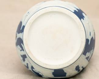 Closeup of the Wedgwood blue jasper dip version of Josiah Wedgwood's Portland vase, c. 1900. Decorated with a white sprig frieze representing the myth of Peleus and Thetis.
