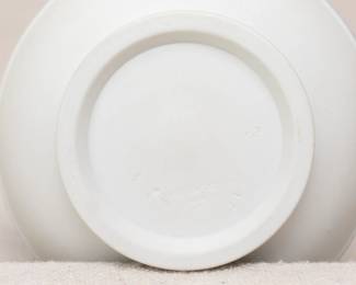 View of the base of the vintage Wedgwood reverse colors jasper "Etruscan" style jug, cream color body with blue applied Grecian mythological figures in the "sacrifice to Cerus" motif between two bands of blue arabesques. 20th century.