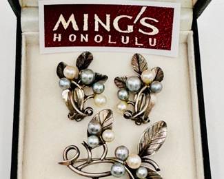 A Ming's Honolulu demi parure cultured pearl and sterling silver brooch and earrings set