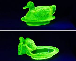 Under black light: vintage Westmoreland uranium vaseline glass duck on nest covered dish