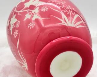 Closeup of the beautiful cameo carved art glass vase, cased glass of warm rosy pink over white and carved with trailing ivy vines