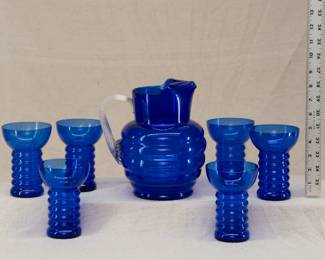 Vintage Dunbar Flint Glass Company 'Aramis' pattern cobalt blue pitcher with clear glass handle, with 6 same pattern tumblers