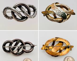 Antique Scottish silver brooches, one in a "lover's knot" style, and one with round frame and curving ribbon, engraved with a floral motif
