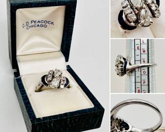 Platinum diamond and sapphire ring in original C.D. Peacock Chicago presentation box
