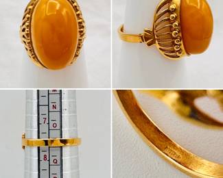 Vintage European hallmarked gold ring with a large bezel set amber cabochon