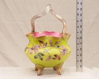 Phenomenal 12-inch tall antique Mt Washington art glass brides basket with glass thorn handle, the basket of hand blown cased glass with finely detailed enameled floral design and resting on 4 gilded feet.