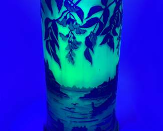Seen under blacklight: A J. Michel Paris cameo glass landscape vase circa 1925, uranium glass, beautifully overlaid and acid etched with sailing boats and gondolas (Venice?) in lagoon, seen through wisteria vines; signed in cameo J. Michel Paris