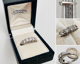 Platinum and diamond ring, in original C. D. Peacock Chicago presentation box
