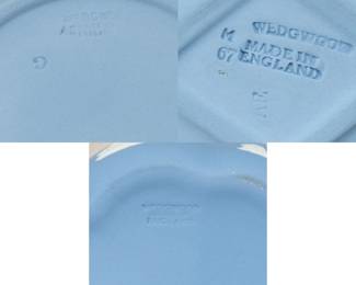 View of the bases of the two Wedgwood light blue jasperware lidded boxes along with a diamond shaped trinket dish