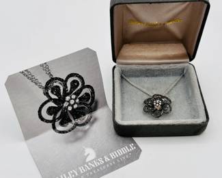 18k white gold Bailey Banks & Biddle black and white diamond flower pendant necklace in original box