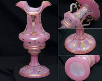 More views of the large Bohemian cut opaque-glass four-handled vase, late 19th century. Likely made for the Persian market. Applied with four loop handles, the opaque glass with pink stain; enameled and gilt with flowers, scrolls, buildings and trailing fruiting vines.