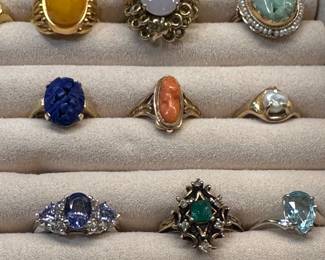 Close up of some of the gold and gemstone rings