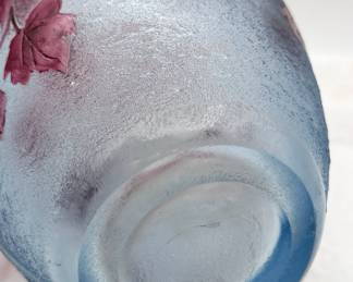 Closeup of the Legras French Art Nouveau cameo glass vase, Legras 'Rubis' series circa 1910, acid etched surface and cameo carved purplish red trailing ivy vines, Legras signature
