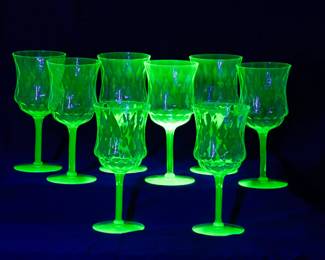 Under black light: Set of eight Tiffin Franciscan 15028 Green Diamond Optic uranium glass water or wine goblets 