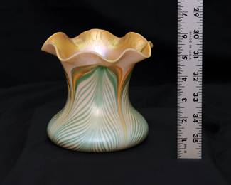 A beautiful antique pulled feather design art glass vase with flared ruffled rim, iridescent gold interior