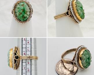 An antique ring set with bezel set carved jadeite encircled by seed pearls set in yellow gold.  This ring dates to the fourth quarter of the 19th century.