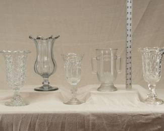 Antique 1850-1870 Boston & Sandwich Glass Co. Diamond Thumbprint pattern celery vase, a Pittsburgh pillar molded celery vase c. 1840-1850, clear lead glass, eight heavy ribs, applied foot, pontil scar on base; a 9.5 inch high glass bullseye pattern celery glass or spooner, a Duncan, George & Sons Shell and Tassel pattern clear EAPG celery or spooner vase from 1874-1891, and "Punty and Gothic Arch" pattern clear pressed glass celery vase 