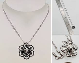 More views of the 18k white gold Bailey Banks & Biddle black and white diamond flower pendant necklace in original box