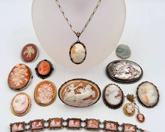 Classical cameo collection! Beautiful carved natural stone (and coral and shell) cameo brooches and delicate necklaces, and a gorgeous antique linked cameos bracelet