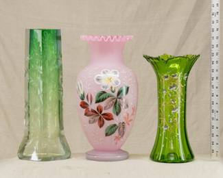 A Moser Karlsbad art glass vase shading from colorless to green, engraved with floral motif; antique pink Bristol art glass vase, cased class with satin finish and hand painted flowers; and a Bohemian glass green glass vase decorated with gold and white enamels 