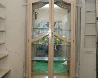 Tall double door lighted display cabinet in the French Provincial style -- perfect for black light cabinet to display your uranium glass collection!