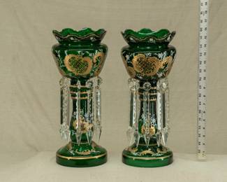 Pair of antique Bohemian art glass mantel lustres, deep green glass, gold and white enamel decoration, and crystal glass prisms