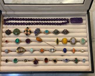 Wonderful selection of gold and gemstone rings including tourmaline, opals, jade, jadeite, fire opal, amethyst, tanzanite, coral, emerald, and so much more!