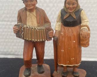 Handcarved Wooden Man Playing Accordion And Elderly Woman