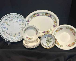 Mismatched Floral Plates And Bowls