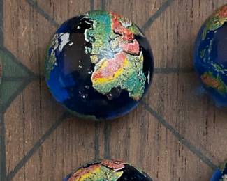 Love these hand made globe marbles!