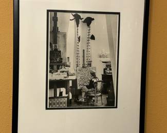 Brassai ( also known as Gyula Halasz, Hungarian French photographer) plate prints of the artists in their studios . This is Salvador Dali in 1955