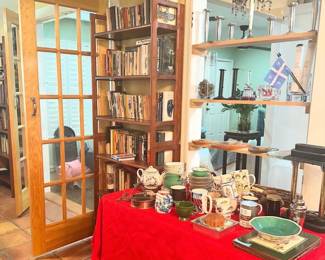 we have several of these wonderful bookcases that fold up completely, they are shown double stacked.