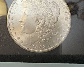 Item # 44 : Black Box Carson City Uncirculated Morgan Silver Dollar - 1883-CC $300.00