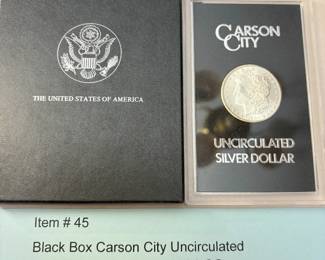Item # 45 : Black Box Carson City Uncirculated Morgan Silver Dollar - 1884-CC $300.00