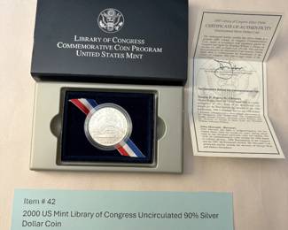Item # 42 : 2000 US Mint Library of Congress Uncirculated 90% Silver Dollar Coin $30.00