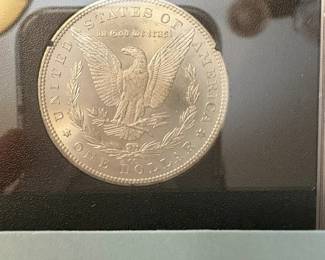 Item # 43 : Black Box Carson City Uncirculated Morgan Silver Dollar - 1882-CC $300.00