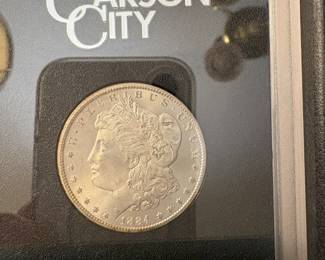 Item # 45 : Black Box Carson City Uncirculated Morgan Silver Dollar - 1884-CC $300.00