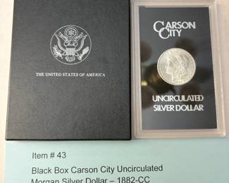 Item # 43 : Black Box Carson City Uncirculated Morgan Silver Dollar - 1882-CC $300.00
