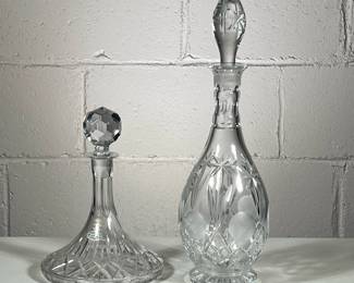 (2pc) Decanturs | Including cut crystal sherry decantur from Croatia with stopper and taller cut glass origin unknown. - h. 16 x w. 5 in