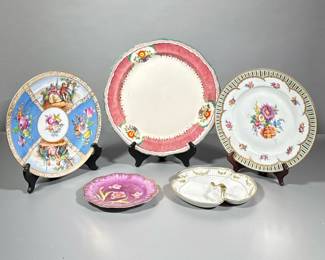 (5pc) Decorative Plates And Serving Pieces | Hand painted 3 section dish with gold trim and handle, small purple plate marked Germany, French inspired plate with florals and courting couple, plate with floral center and gold trim, larger plate with cranberry colored rim. All are marked. - dia. 12.5 in (Largest dish)