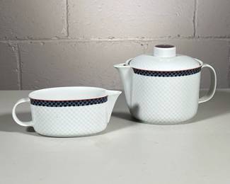 (2pc) Tea Pot And Creamer | Marked Made in West Germany. White with checkered trim. - h. 6 x w. 8 in