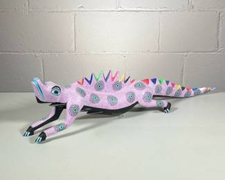 CARVED WOOD IGUANA | Carved wood & colorfully painted iguana or lizard, signed on bottom “Poyfiyio Sosa Gutieyyez” - h. 7 x w. 5.5 x l. 27 in