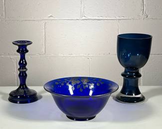 (3pc) Matching Bowl And Candle Stick Holder Plus Vase/Challis | Dark blue bowl and candlestick holder have painted dogwood leaves and flowers as accents. Dark blue wide vase or Challis. - h. 4 x dia. 9.5 in (bowl)